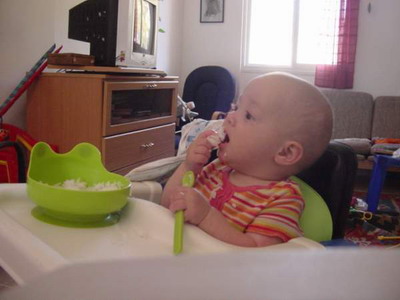 Lotem eating rice